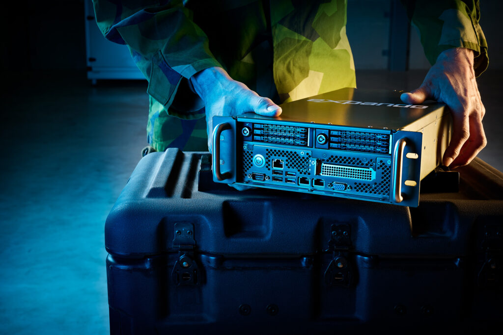 Man holding a green server