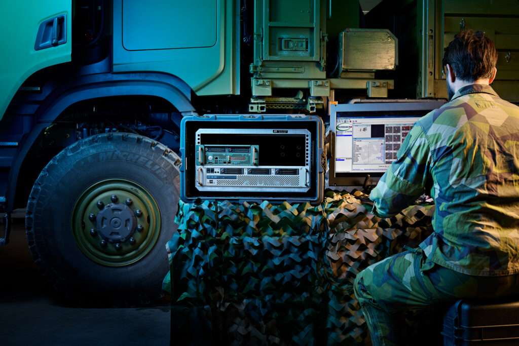 Military C&C central with green truck