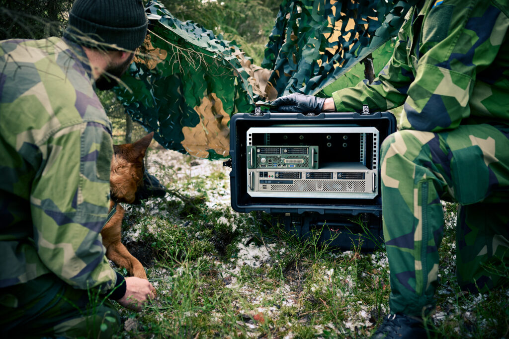 rugged server in the nature with a adog next to it